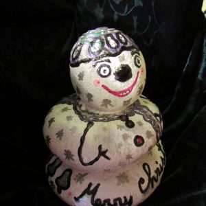 Snowy hand-painted rock