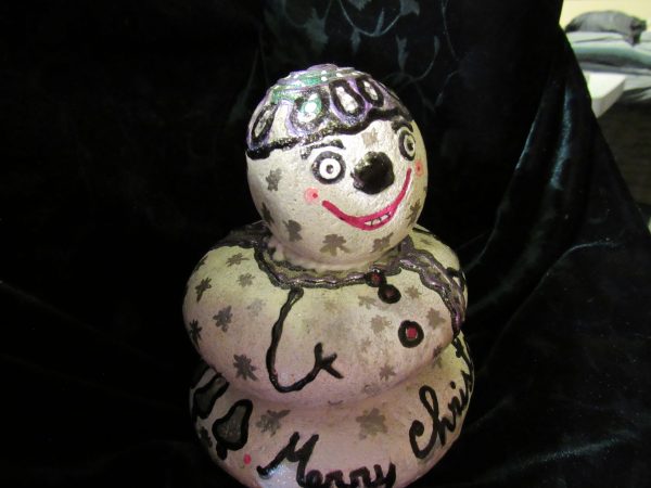 Snowy hand-painted rock