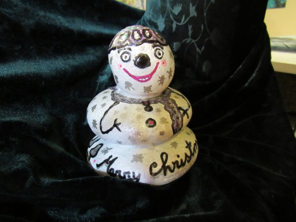 Snowy hand-painted rock